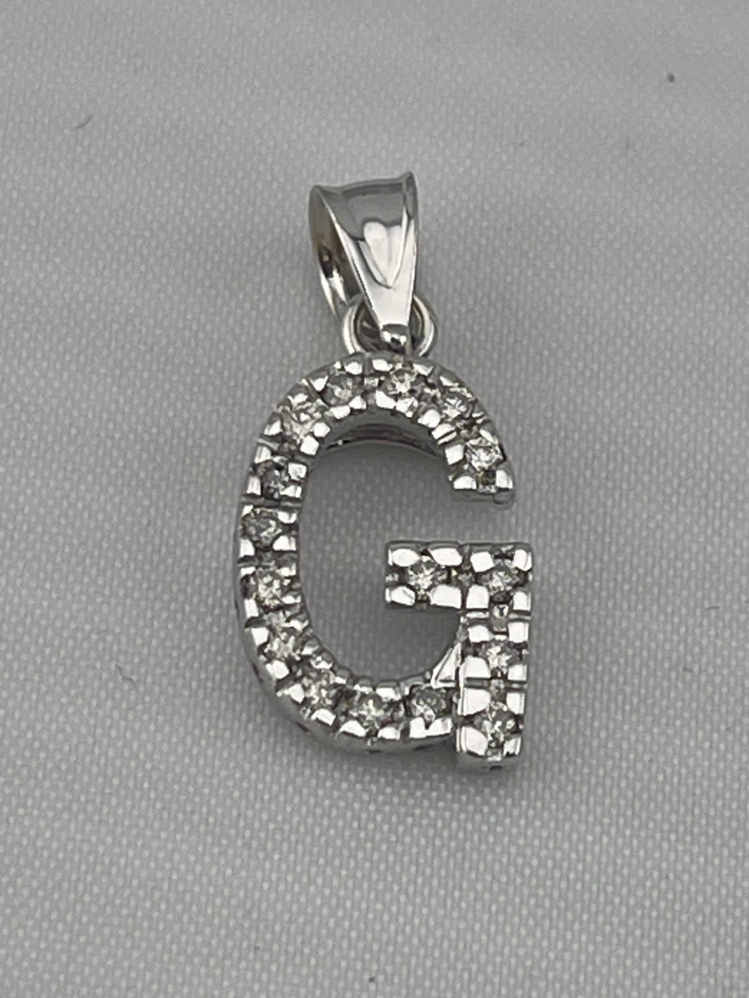 Vintage quarter carat diamond G pendant 14 karat white gold