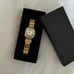 Women's Gold and Silver Watch