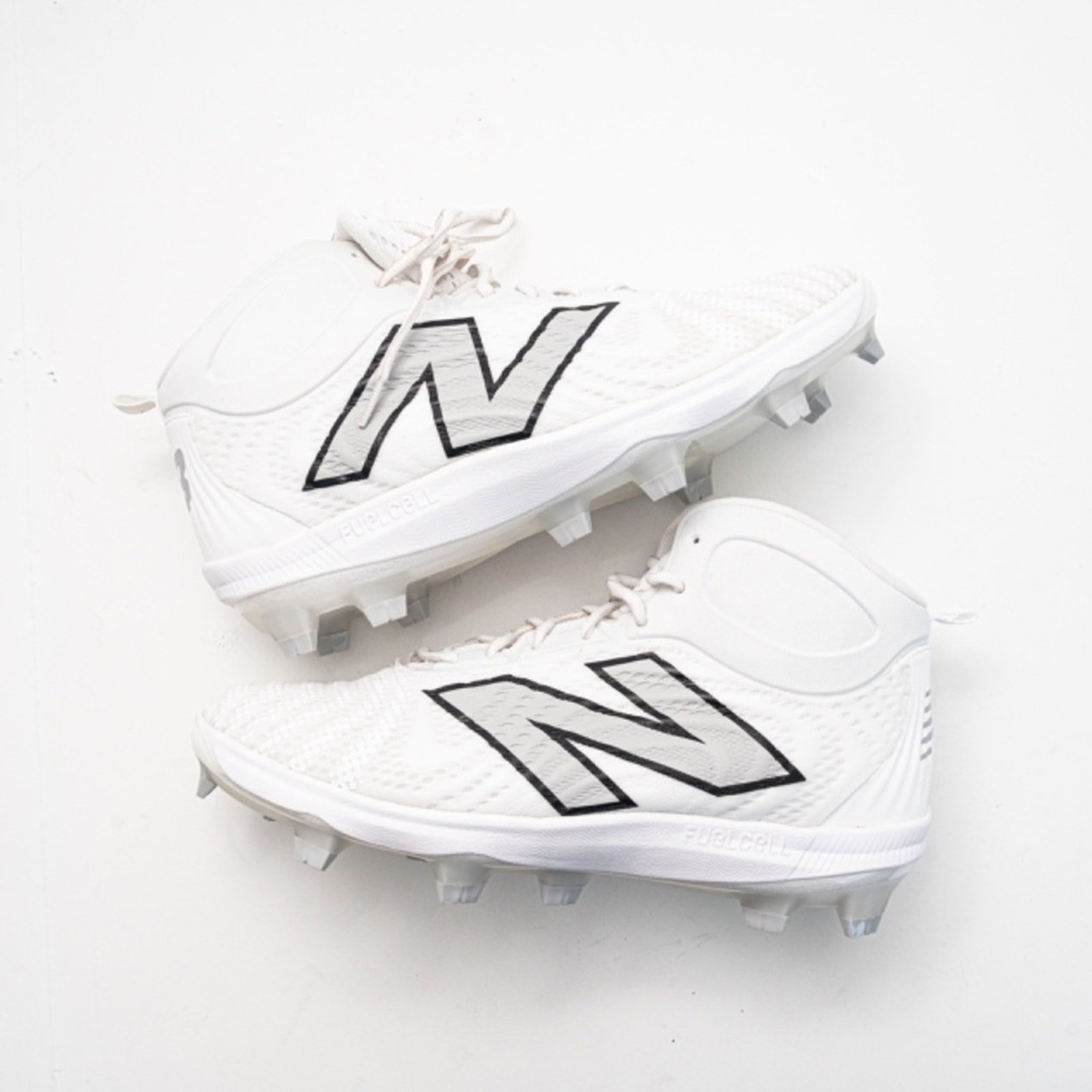 New Balance. FuelCell 4040v7 Mid-Molded Baseball Cleats.