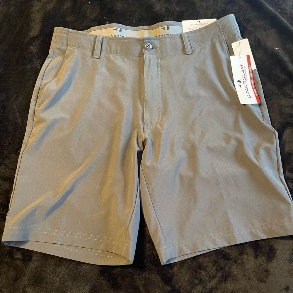 Grand Slam stretch 360 gray flat front shorts, size 34 new with tags