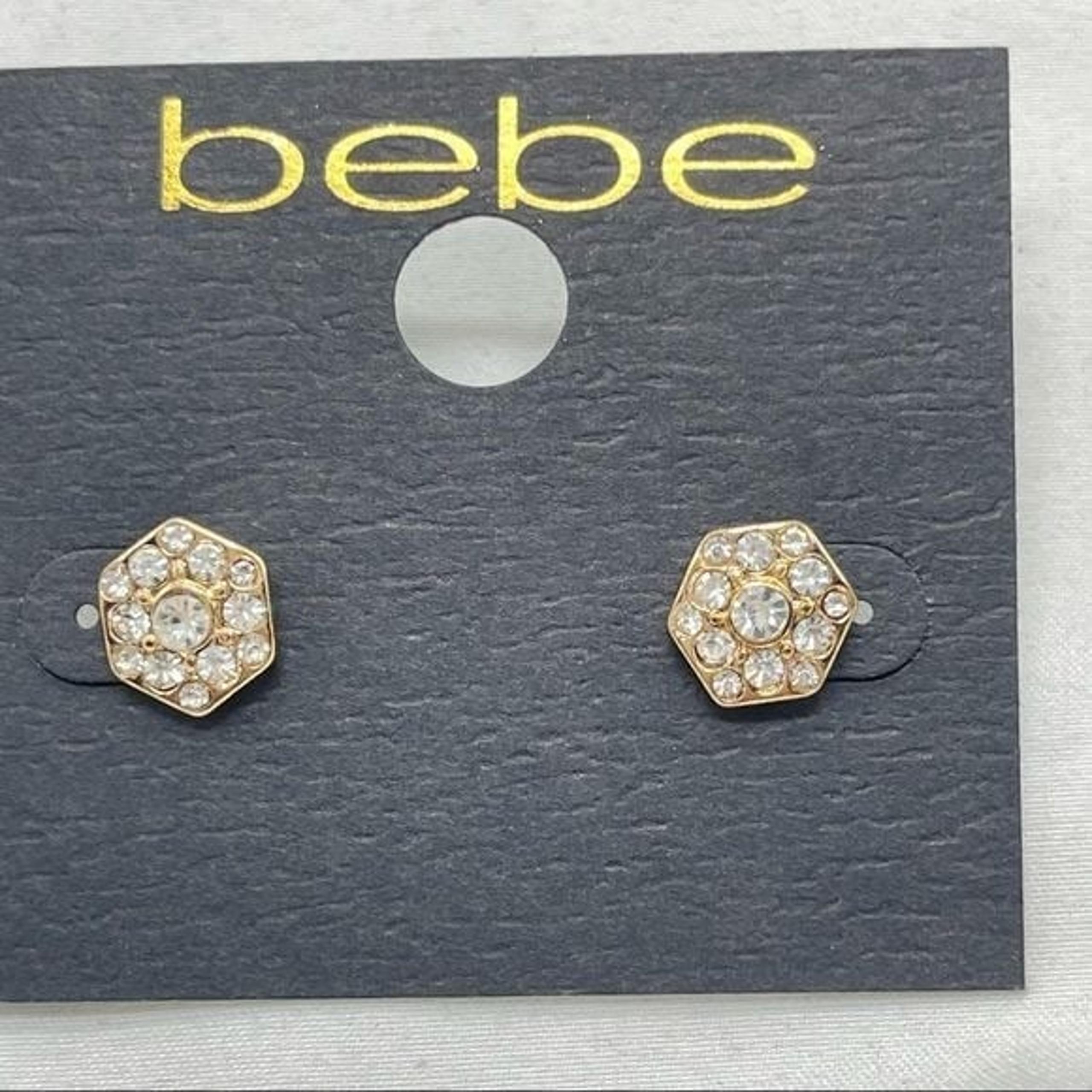 BEBE Earrings   - geometric gold tone studs with pavé crystal setting