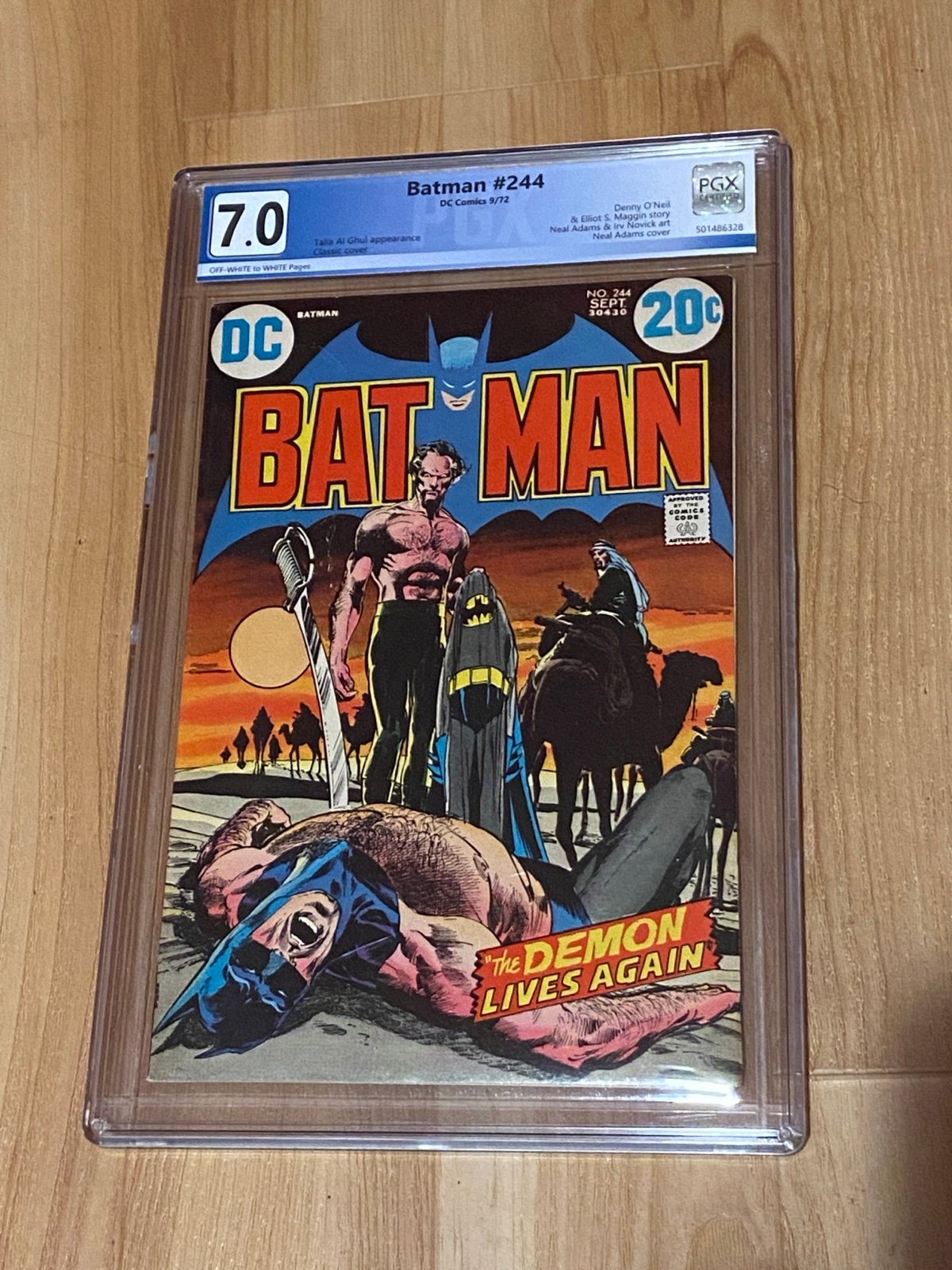 Batman 244 PGX graded 7.0