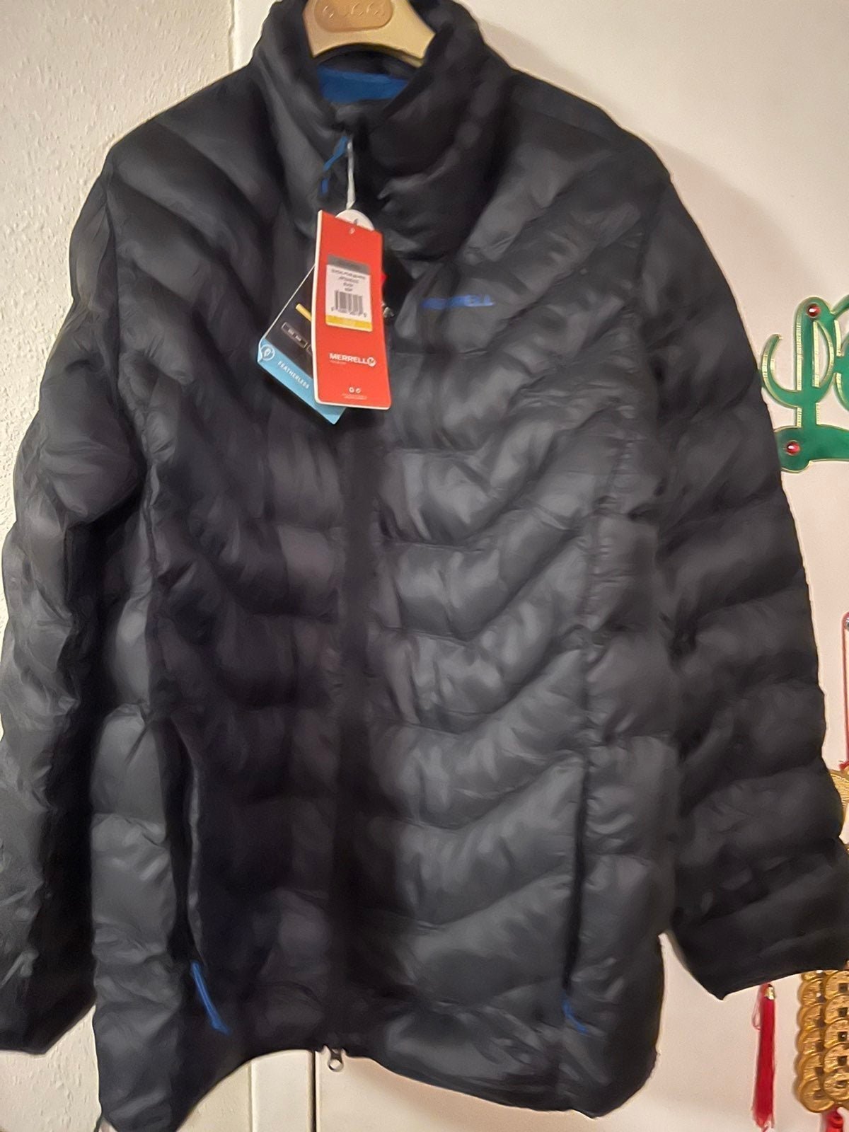 199 New Men’s Merrell Parka Down Jacket , Size PM , Black Color.