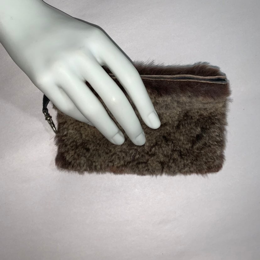 CHANEL small zip top brown shearling pochette on leash CLUTCH