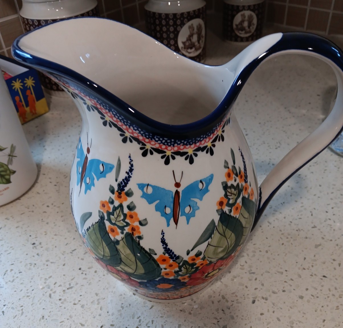 Blue Rose Polish Pottery Floral Butterfly Pitcher