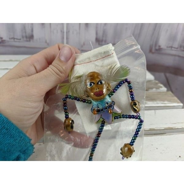 Laura Stamper artist brooch pin person m