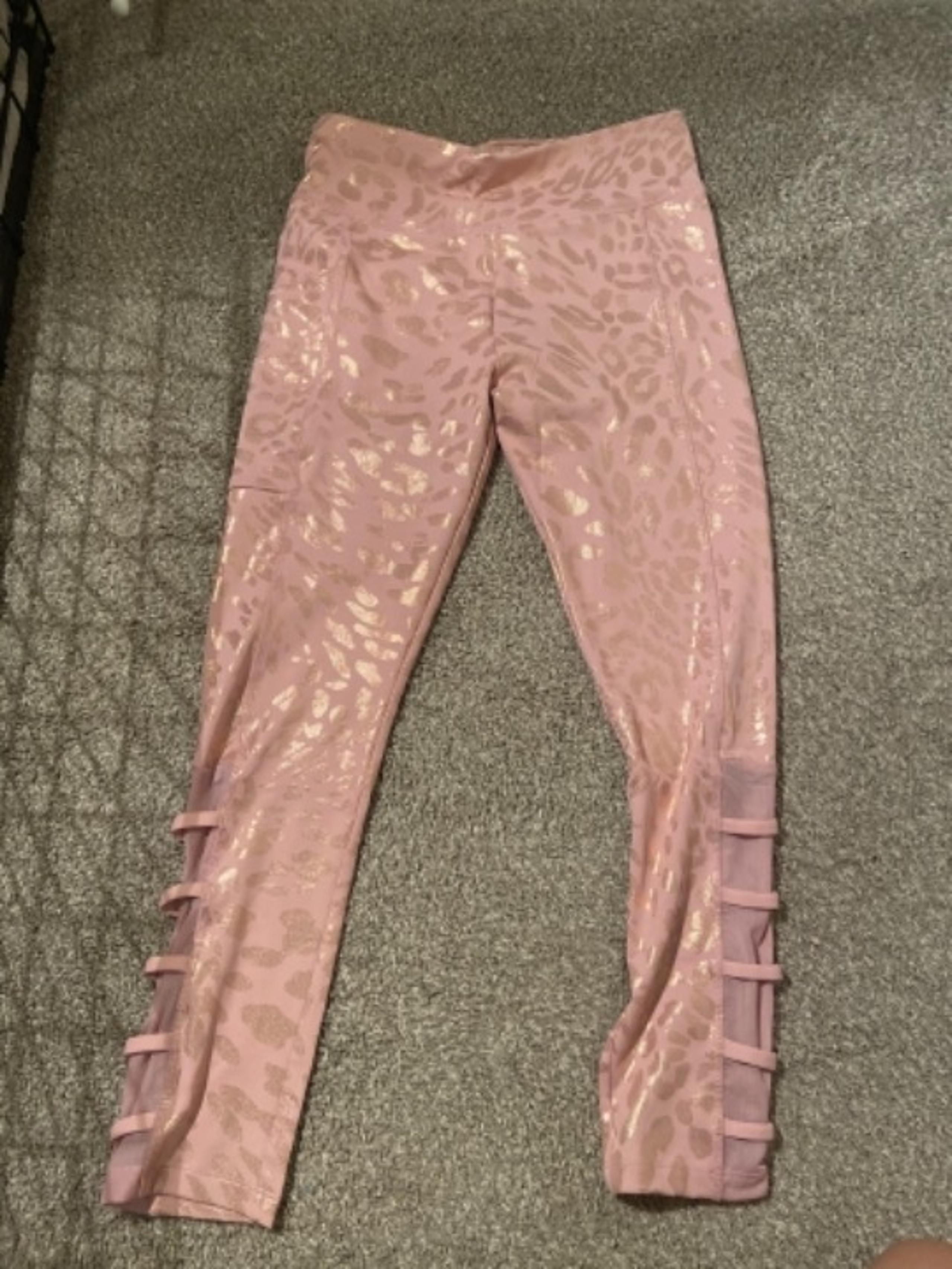 Pink cheetah print leggings with slits