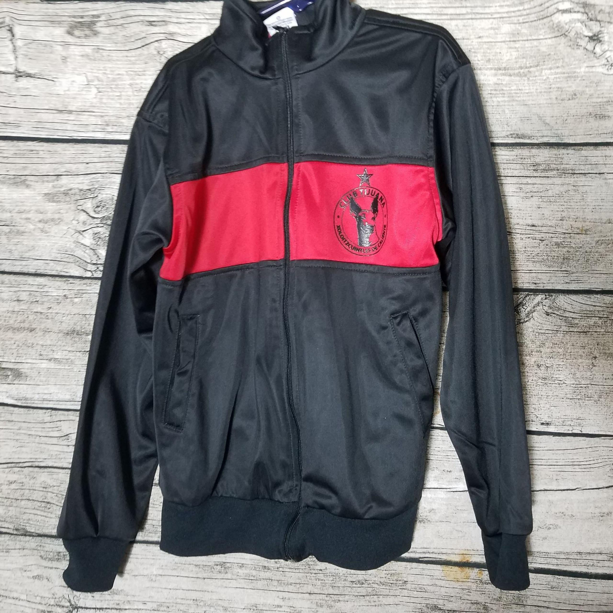 Kid's Club Tijuana Jacket Size 6

Pit to pit approx:  16 inches 
Right shoulder