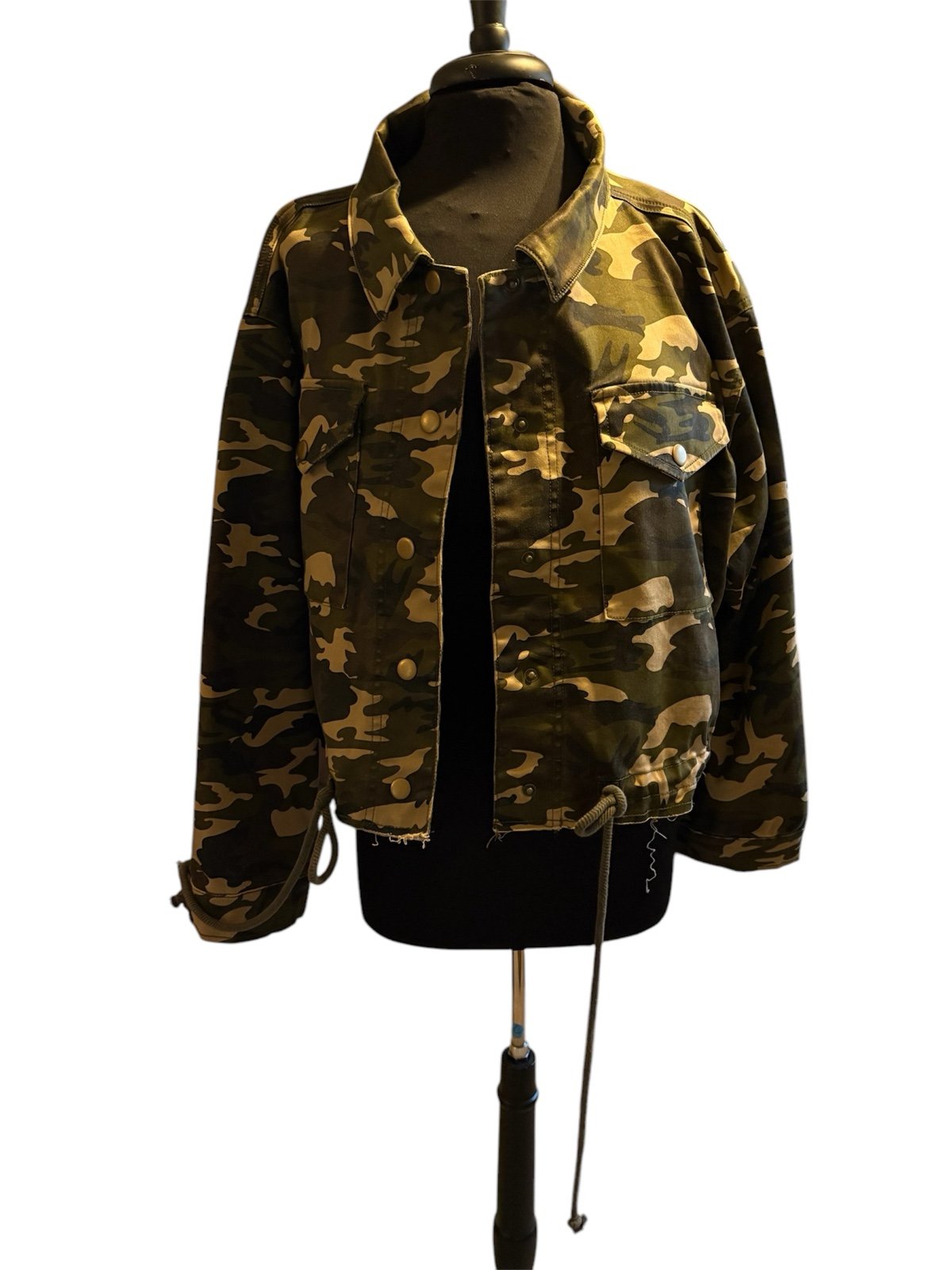 Military camouflage lightweight jacket with front buttons and on sleeve. CCotton