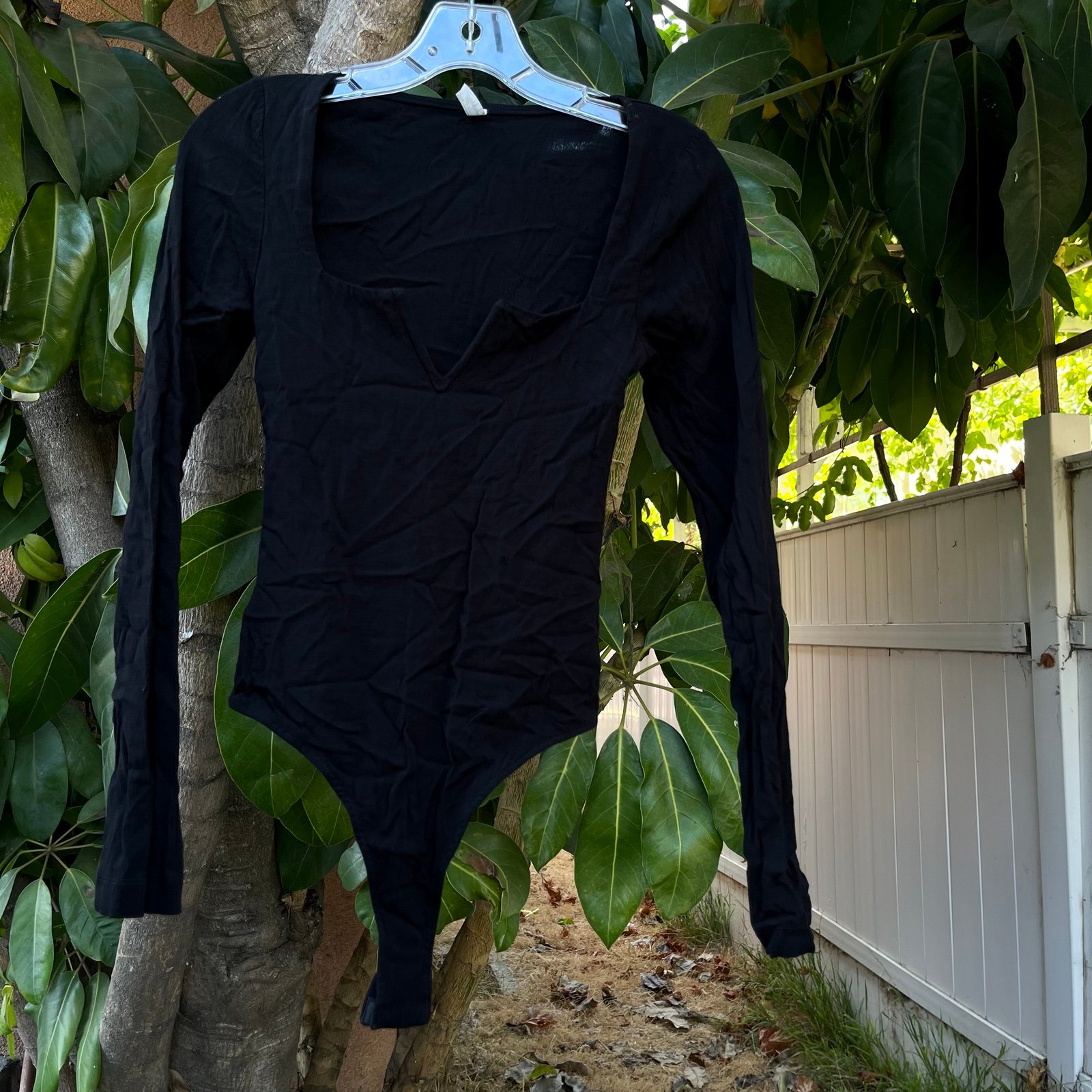 Free People Pippa Black Sleeveless Bodysuit in black .