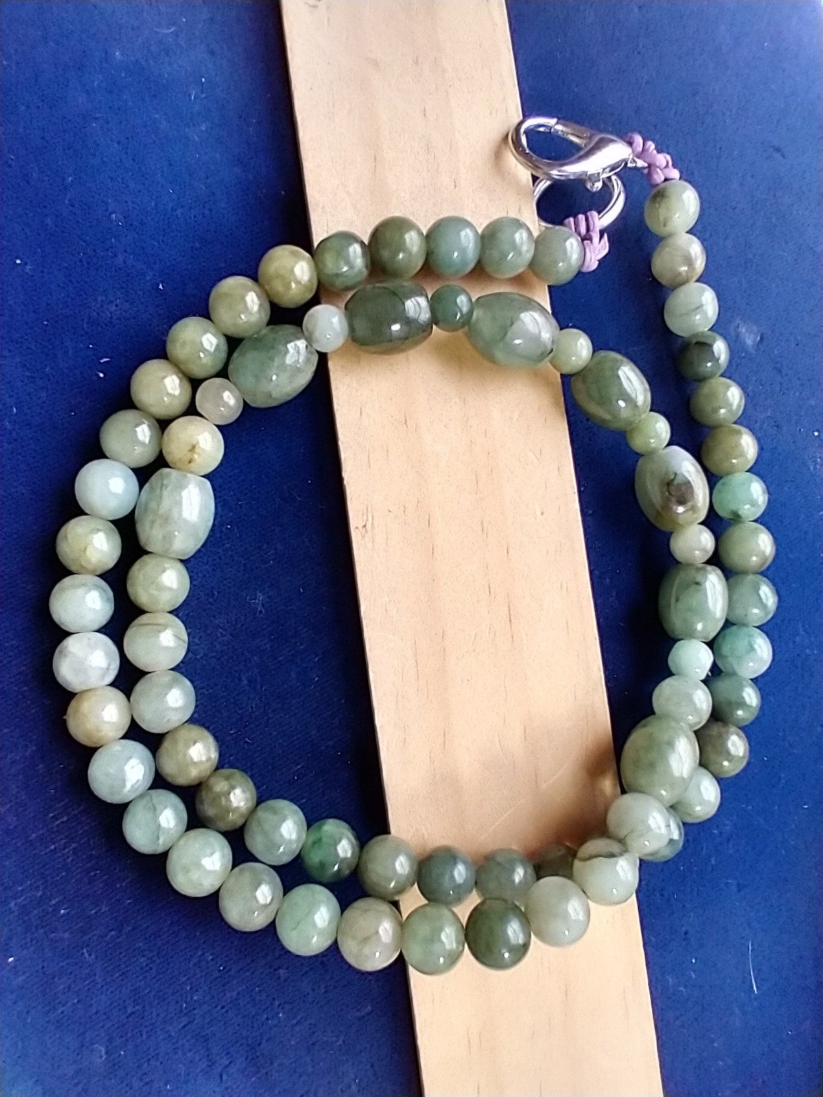 Necklace 265. Jade. Oil. Barrels.