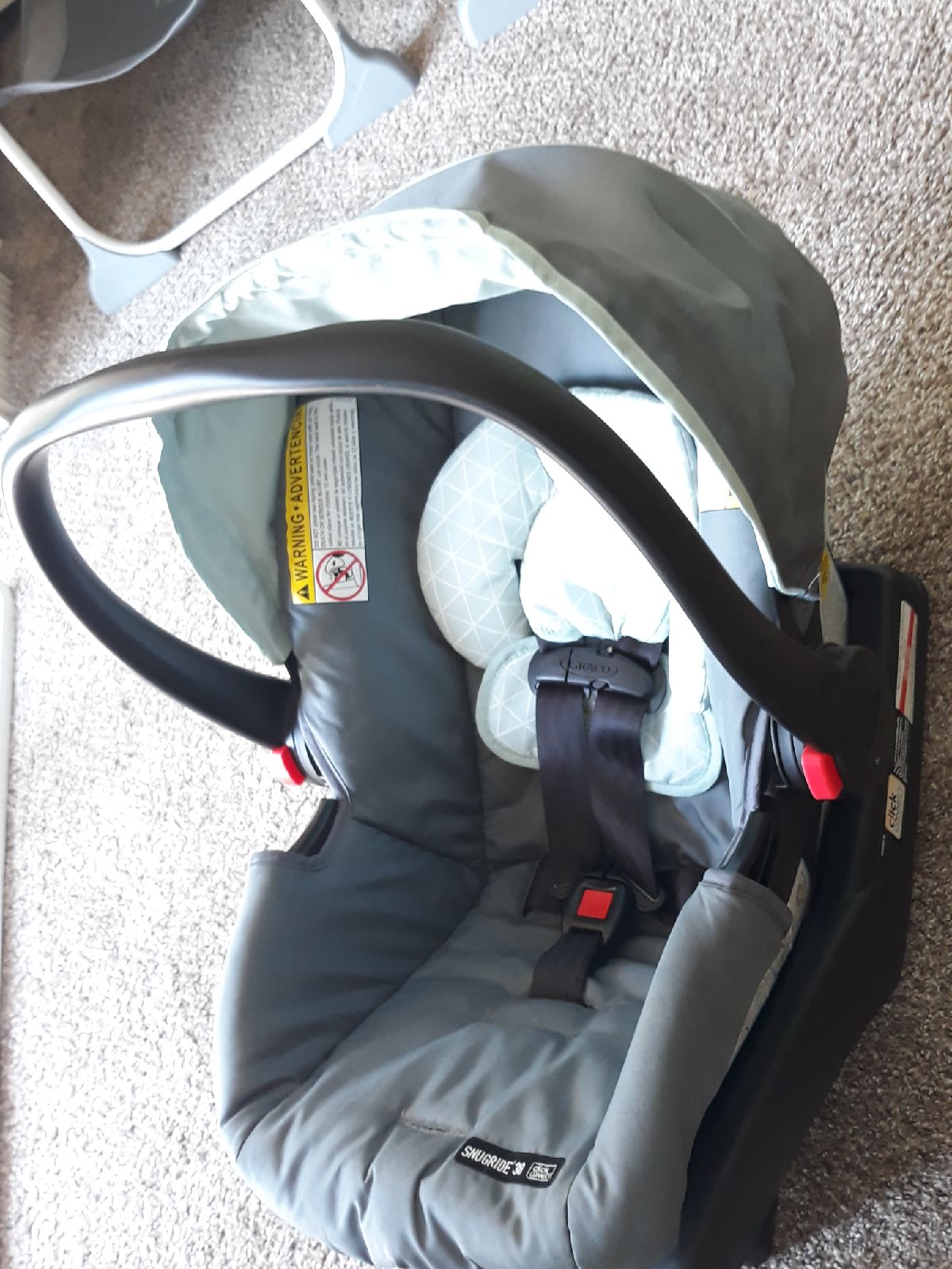 TWO infant car seat rear facing snug ri