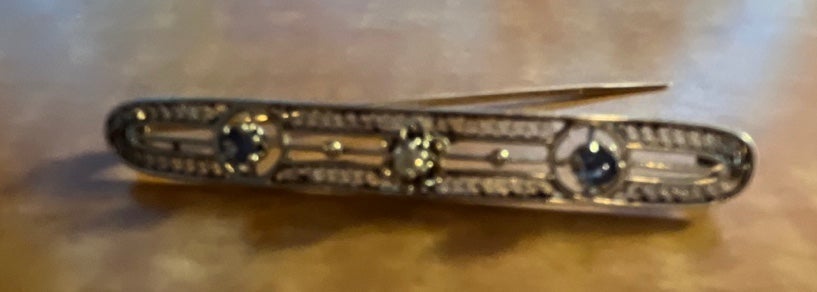 Antique 14 karat, white gold and yellow gold, sapphire and diamond bar pin