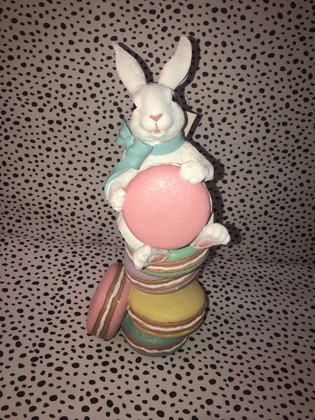 ❌ bunny sitting on macaroon stack ❌