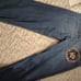 Vintage Men's Baggy Blue Jeans by Evolution in Design with an Embroidered Patch