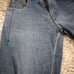 Vintage Men's Baggy Blue Jeans by Evolution in Design with an Embroidered Patch