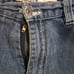 Vintage Men's Baggy Blue Jeans by Evolution in Design with an Embroidered Patch