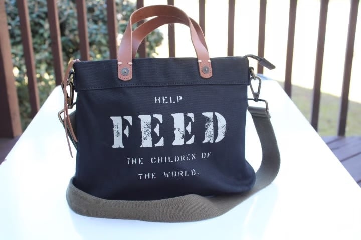 Feed help feed the children of the world black mini tote NWT no long strap