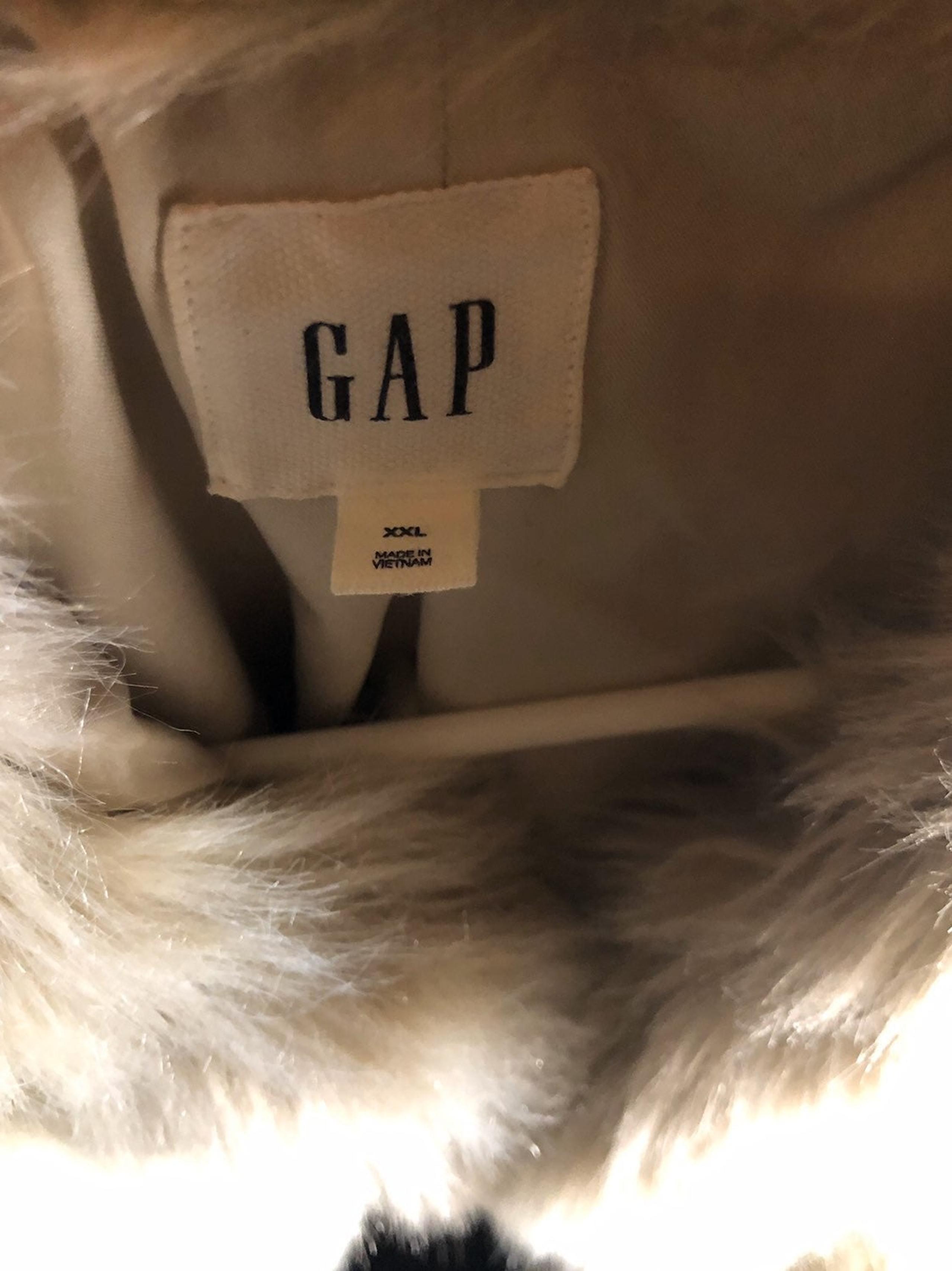 white fur vest