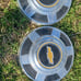 2 1980's chevy truck hub caps