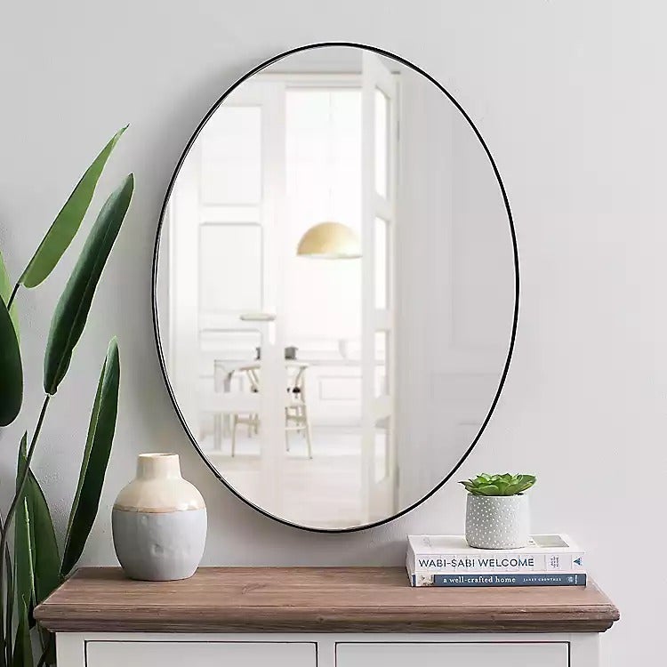 I want to sell Black Metal Oval Wall Mirror unopened