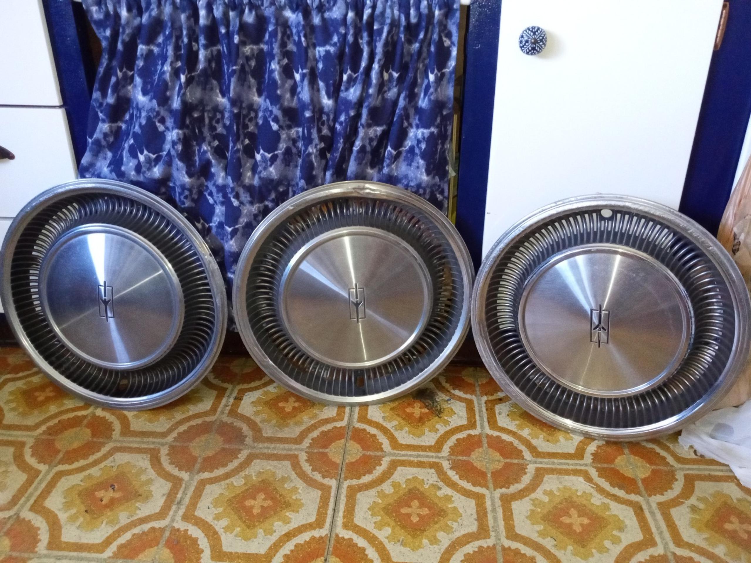 3-15" Oldsmobile Delta 88 hubcaps
