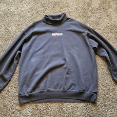 Mogul Moves Turtleneck Sweater