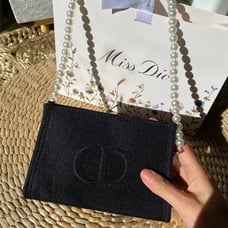 Dior makeup pouch bag with pearl chain