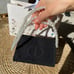 Dior makeup pouch bag with pearl chain