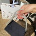 Dior makeup pouch bag with pearl chain