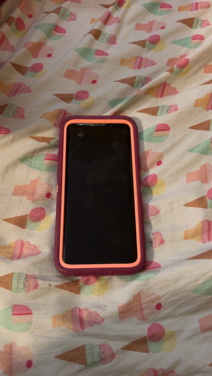 Samsung Galaxy S9 purple with cracked screen and case