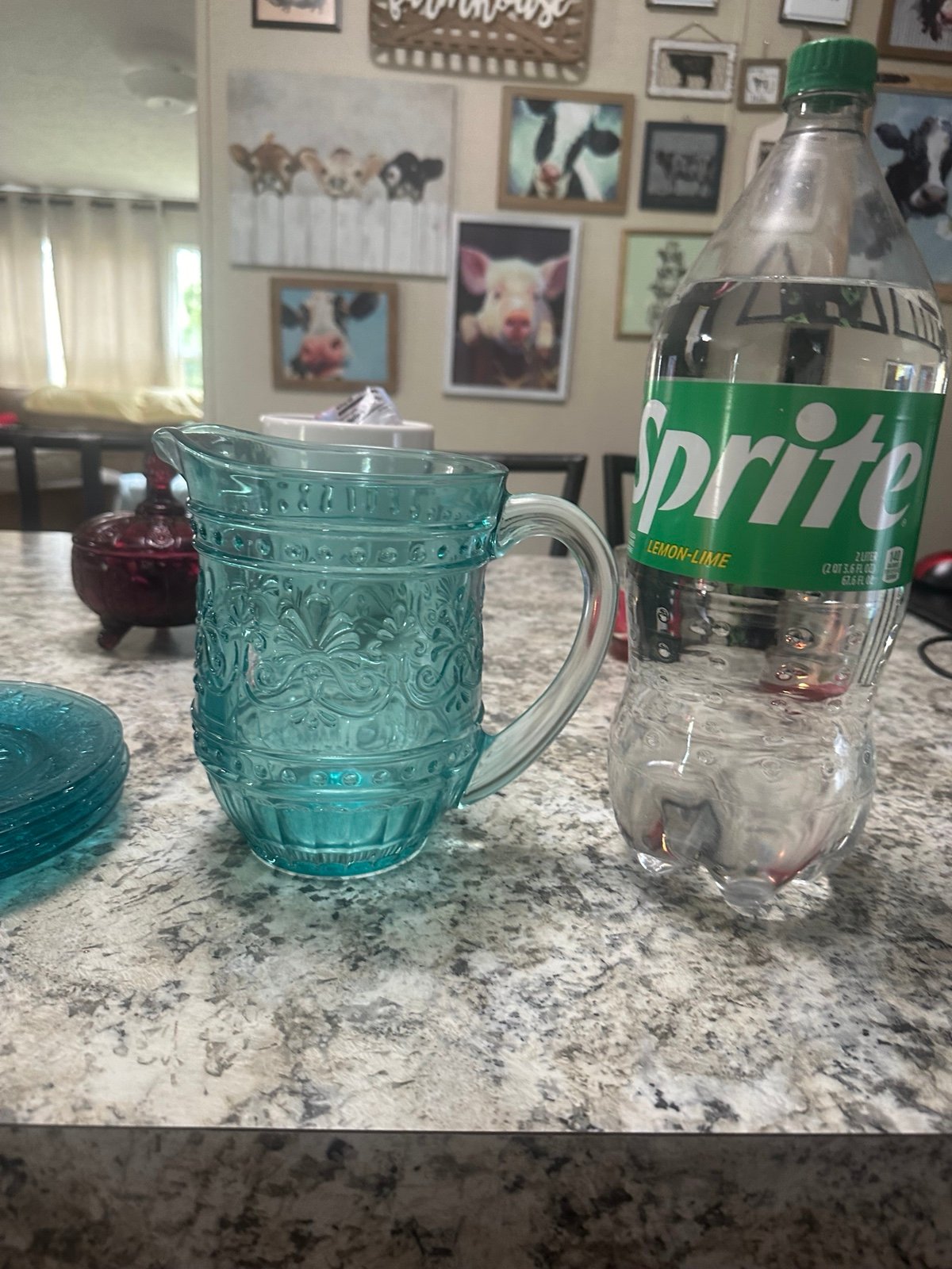 Pioneer woman teal glass pitcher and 4 small glass plates