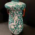 Handled green dogwood vase