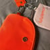 Lululemon dual pouch orange and baby light orange