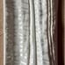 Brand new custom hobbled Bali roman shades in ivory.