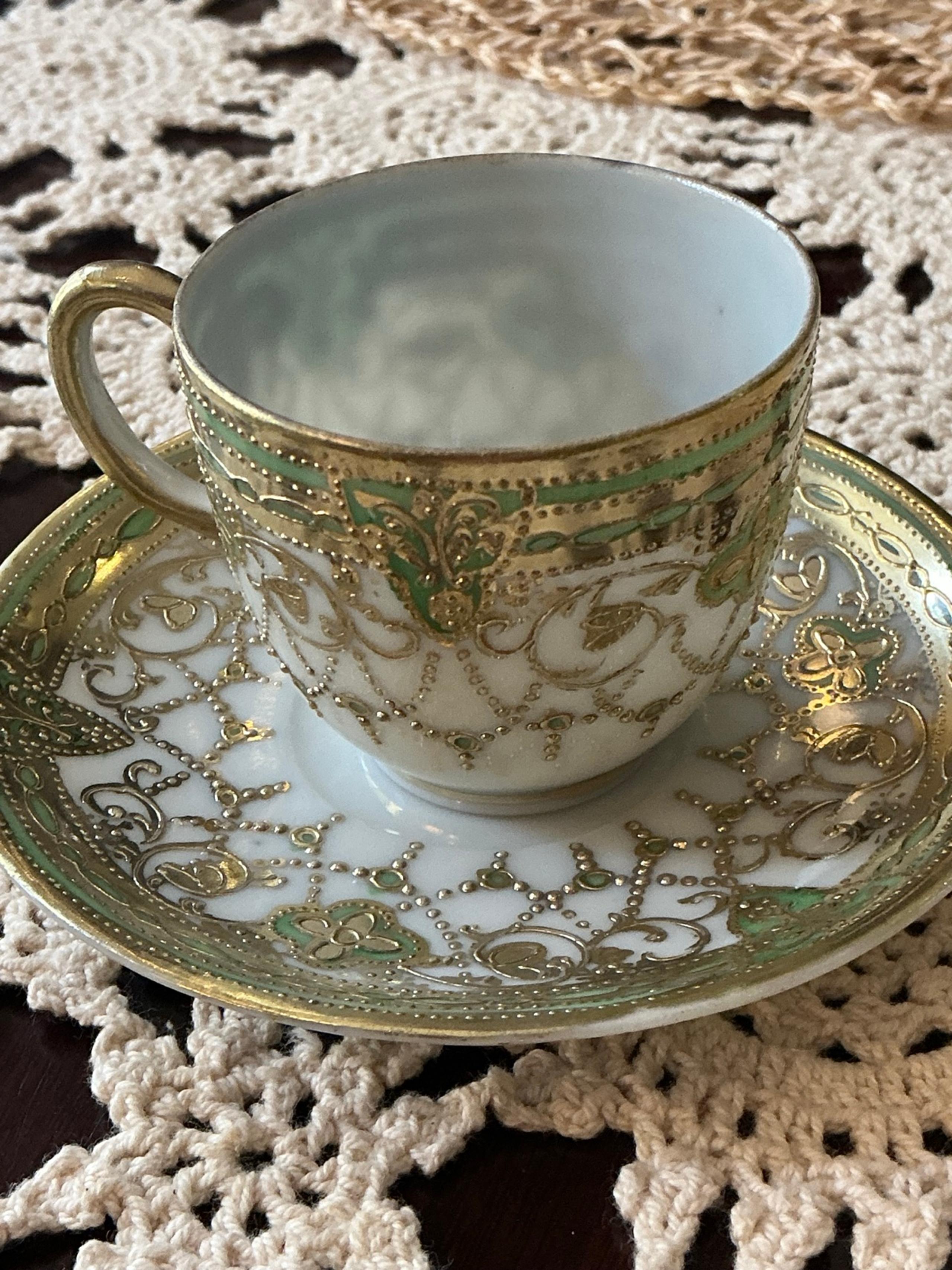 Antique Japanese Tea cup and Saucer