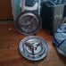 2 Oldsmobile spinner hubcaps