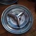 2 Oldsmobile spinner hubcaps