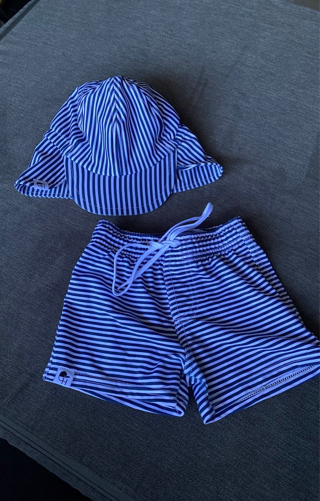 George sold hats swim