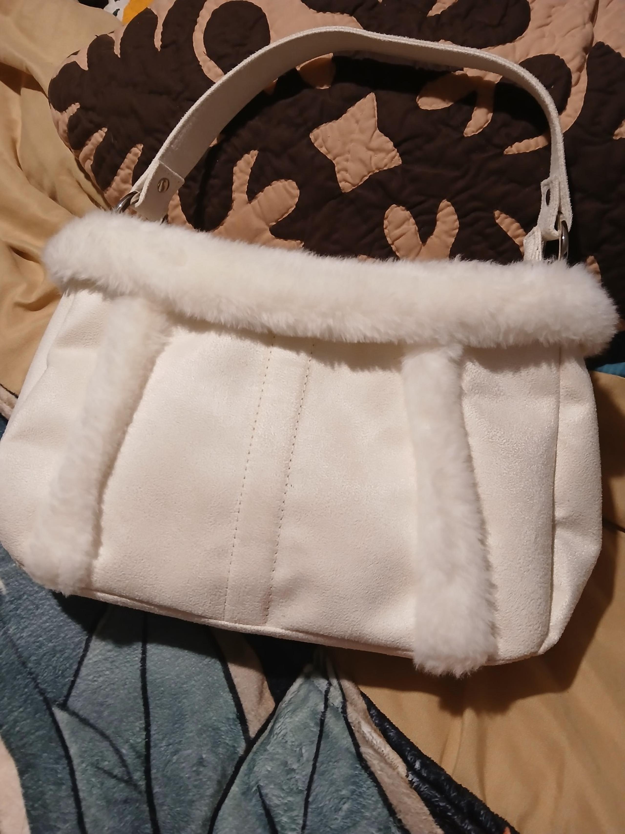 Bath and body works faux fur swade purse bag.