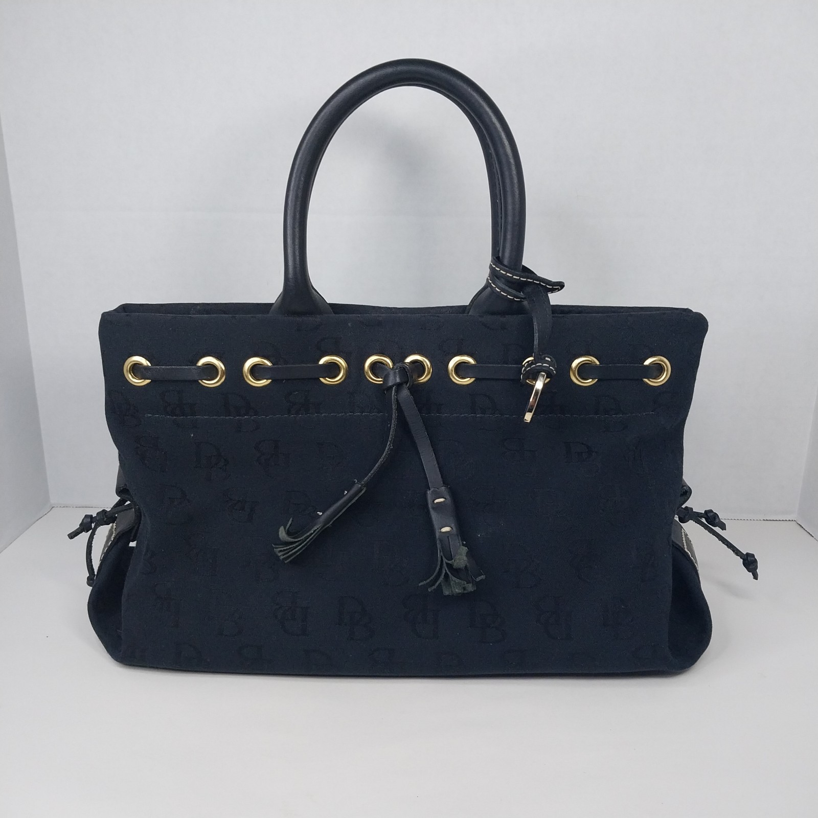 DOONEY & BOURKE shoulder purse black mini jacquard and leather trim tassel charm