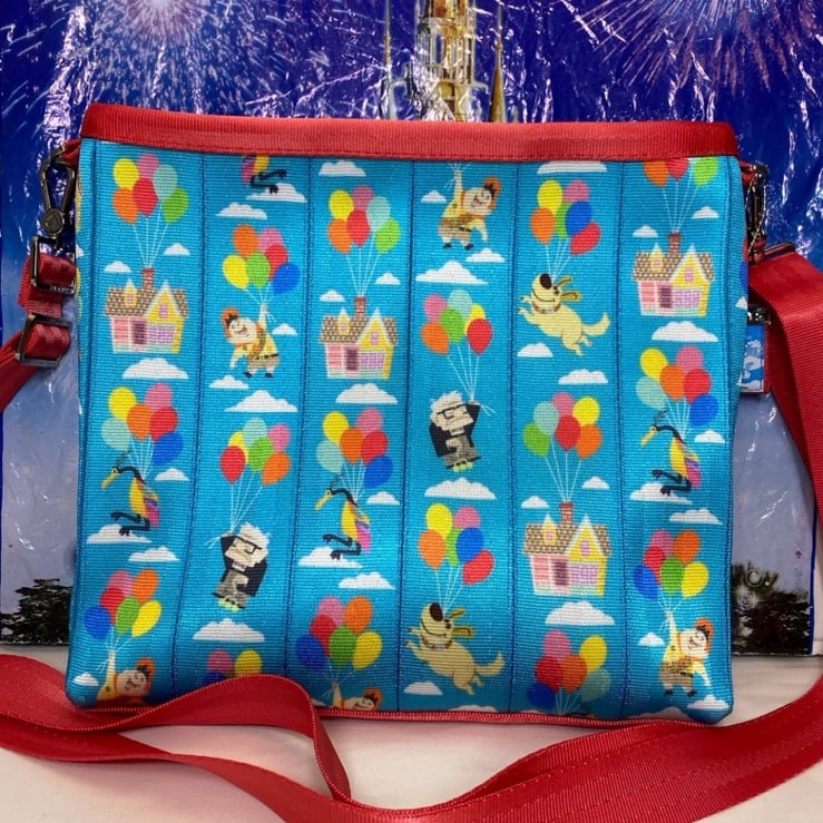 Disney Parks x Harvey’s Pixar UP! Character AOP convertible crossbody/ backpack