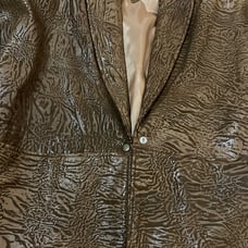 Brown leather pants suit