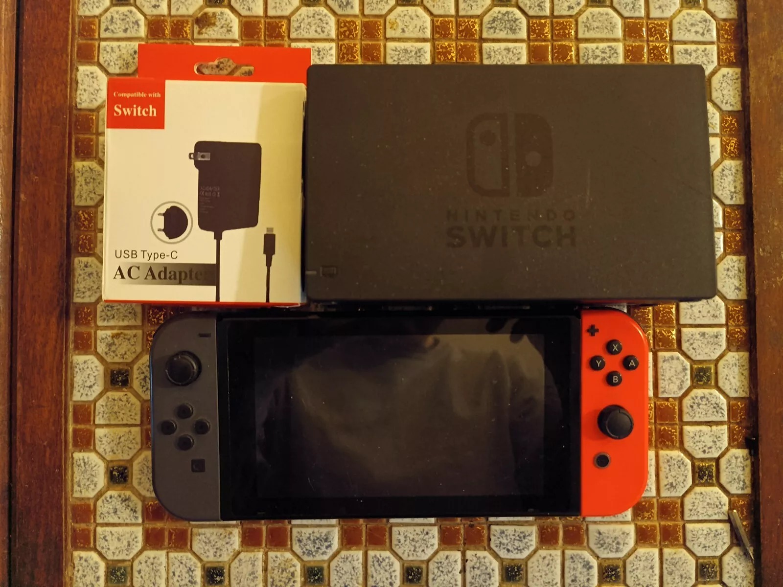 Nintendo HAC00101 Handheld System - Gray and Red Joycon
