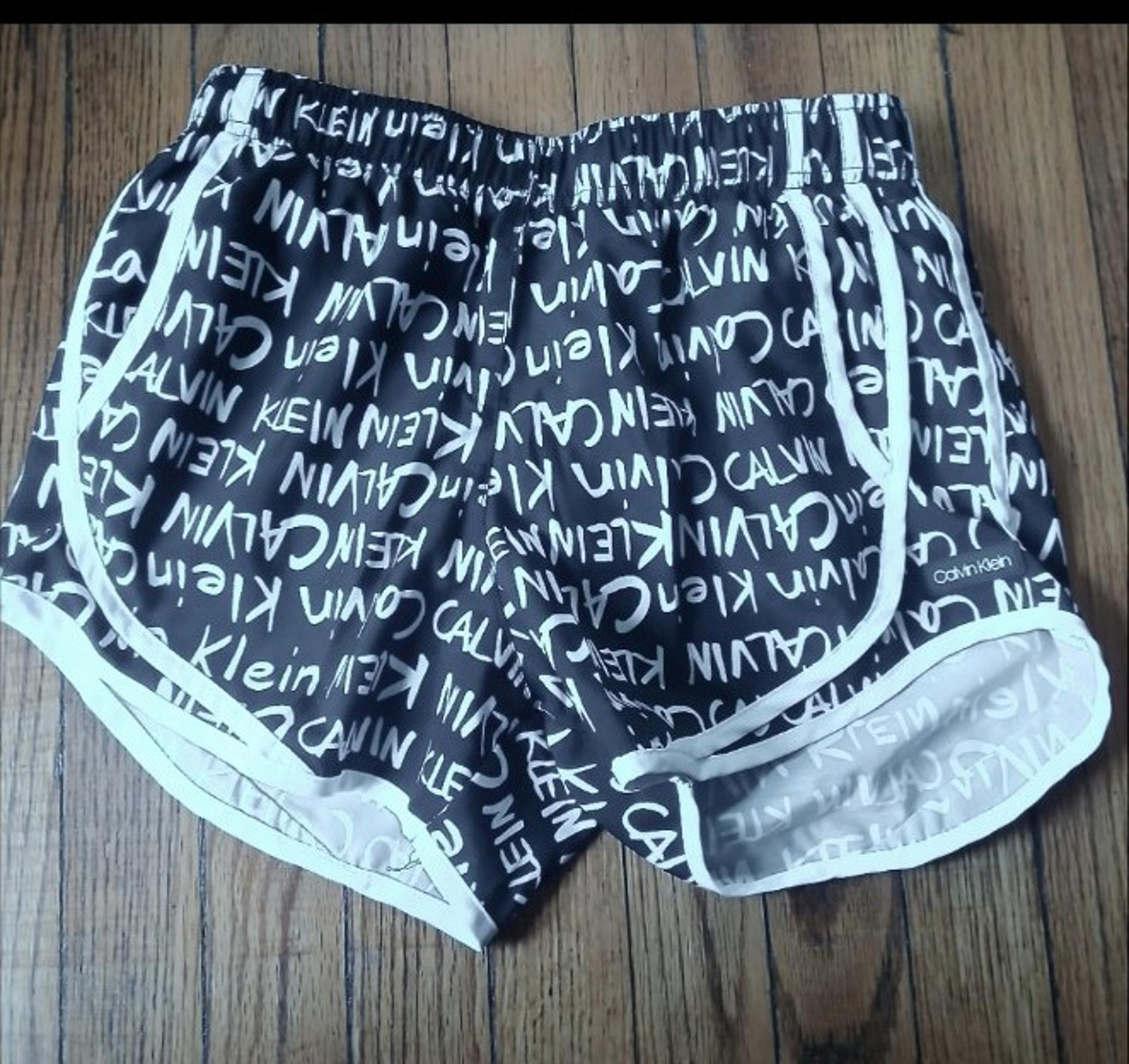 Calvin Klein - Women's Black/White Logo Stretch Lined Running Shorts. Size XS