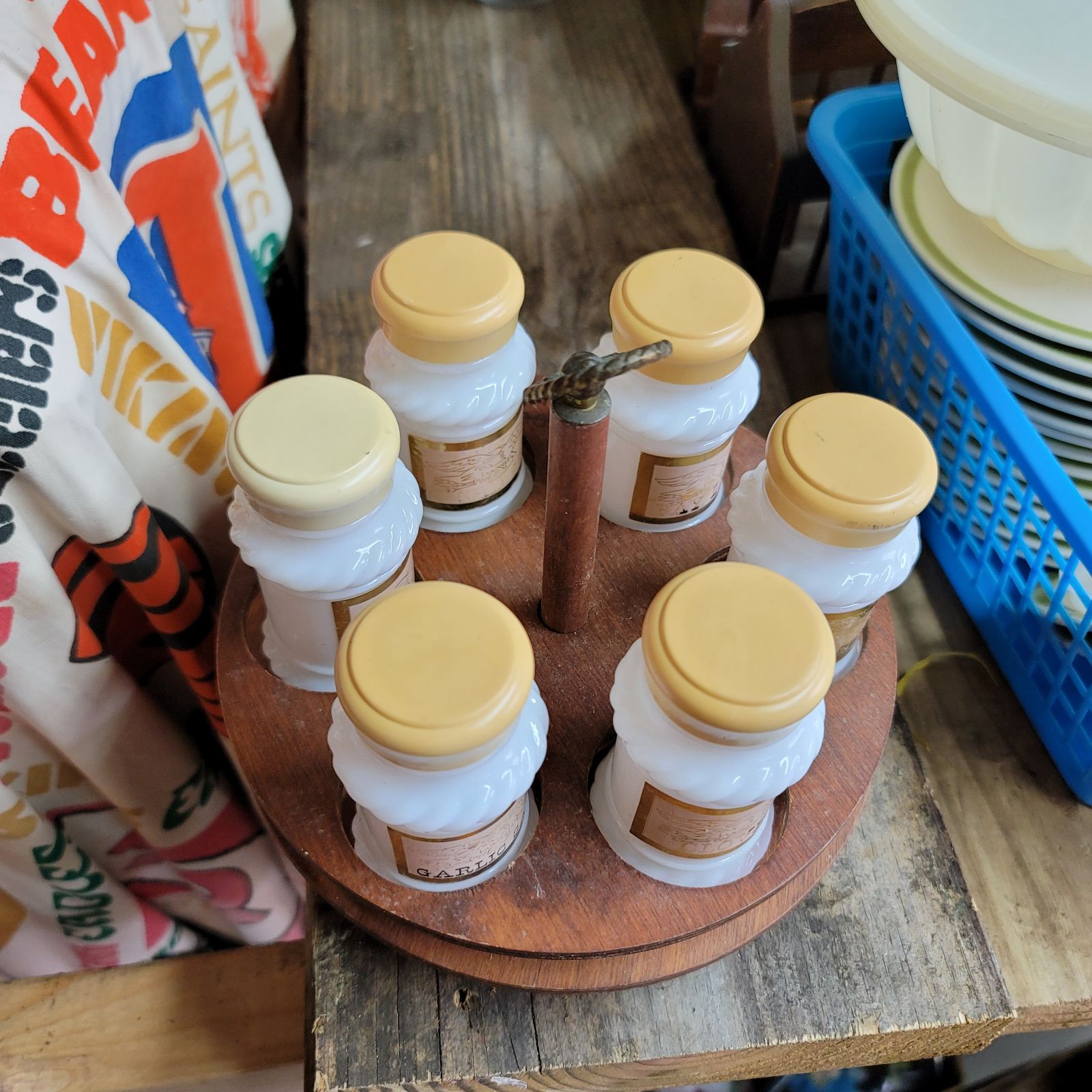 SET OF SIX VINTAGE MILK GLASS SPICE JARS ON WOODEN STAND