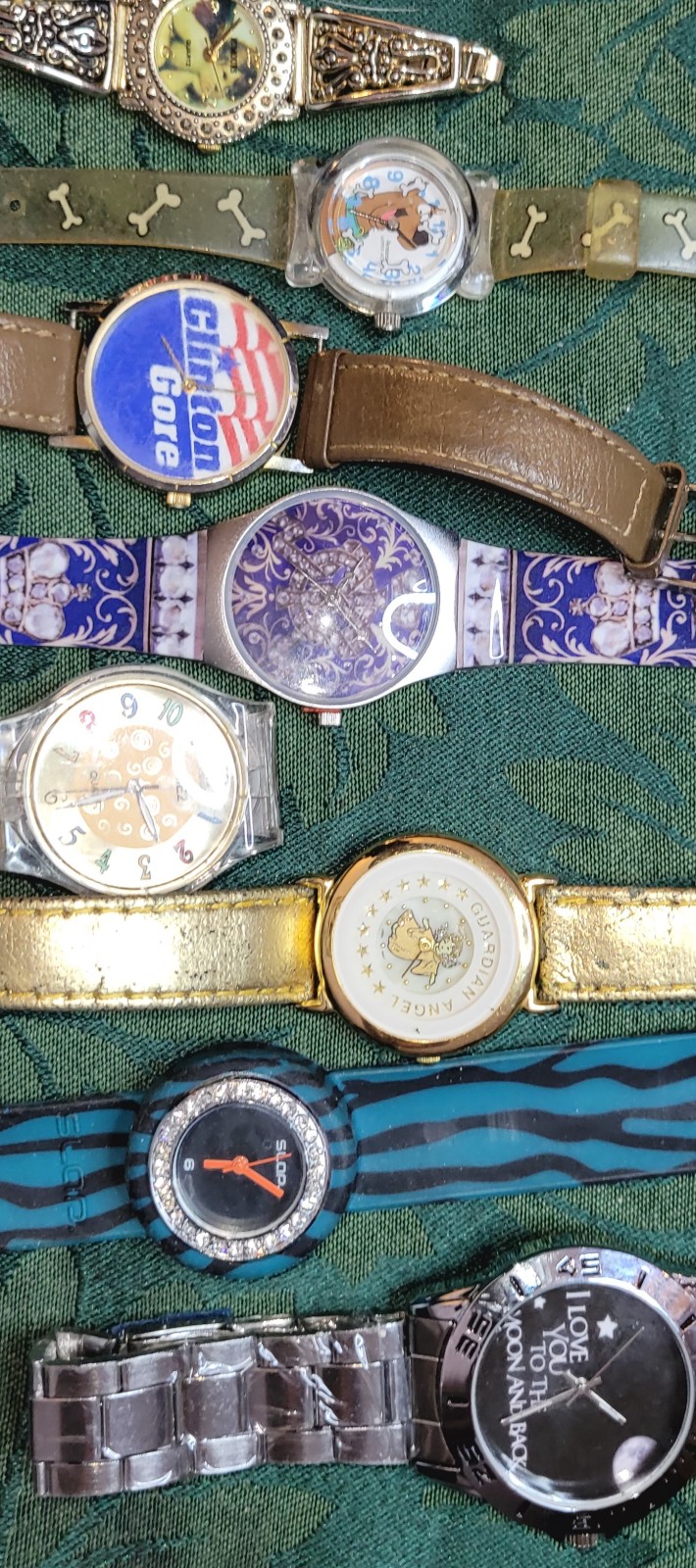 Graphic Watches: lot of five quartz analog watches with graphic dials.
