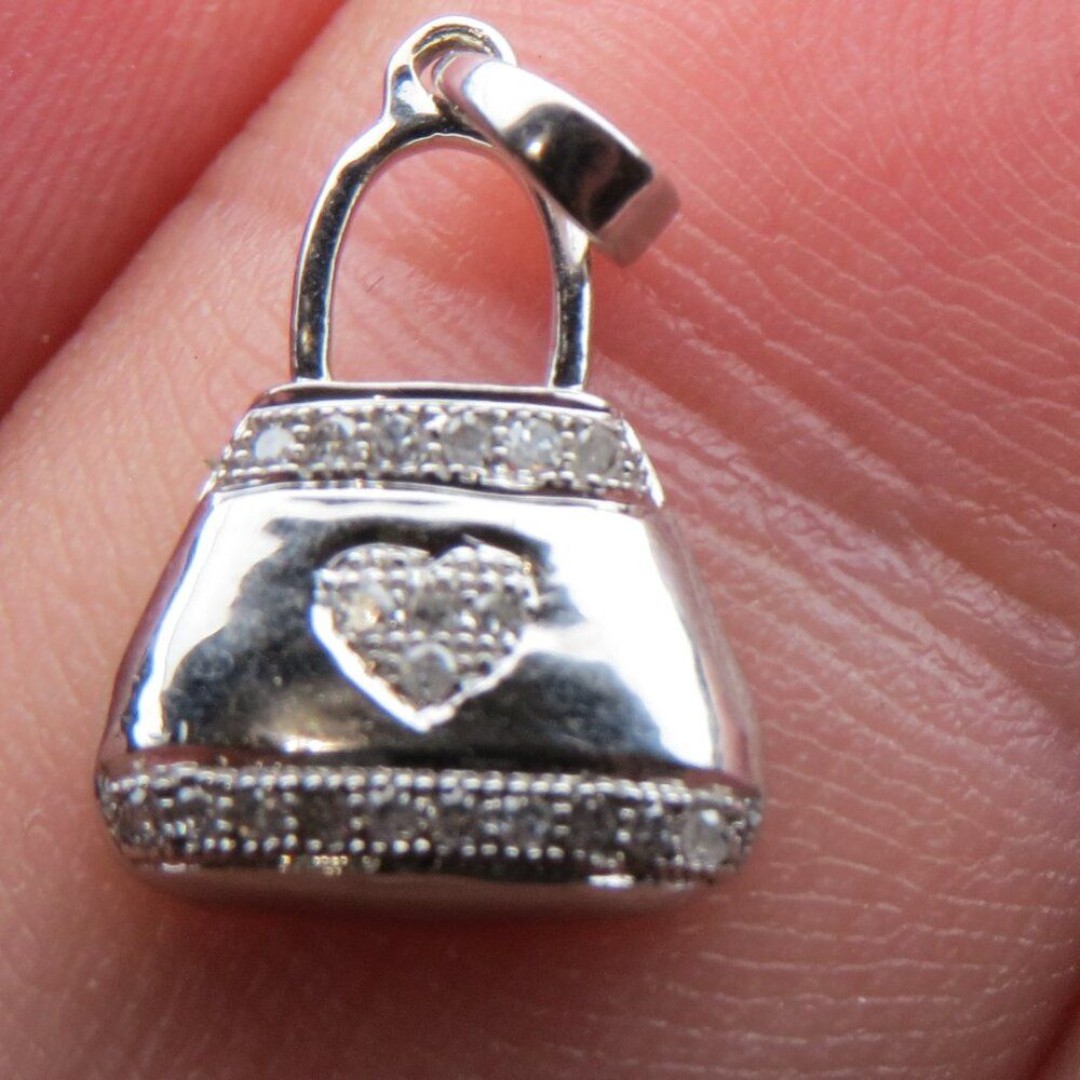 850 10k Gold Diamond Money Bag Hear Pendent