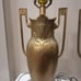 Neoclassical Renaissance Revival Greek style brass tone footed table lamps