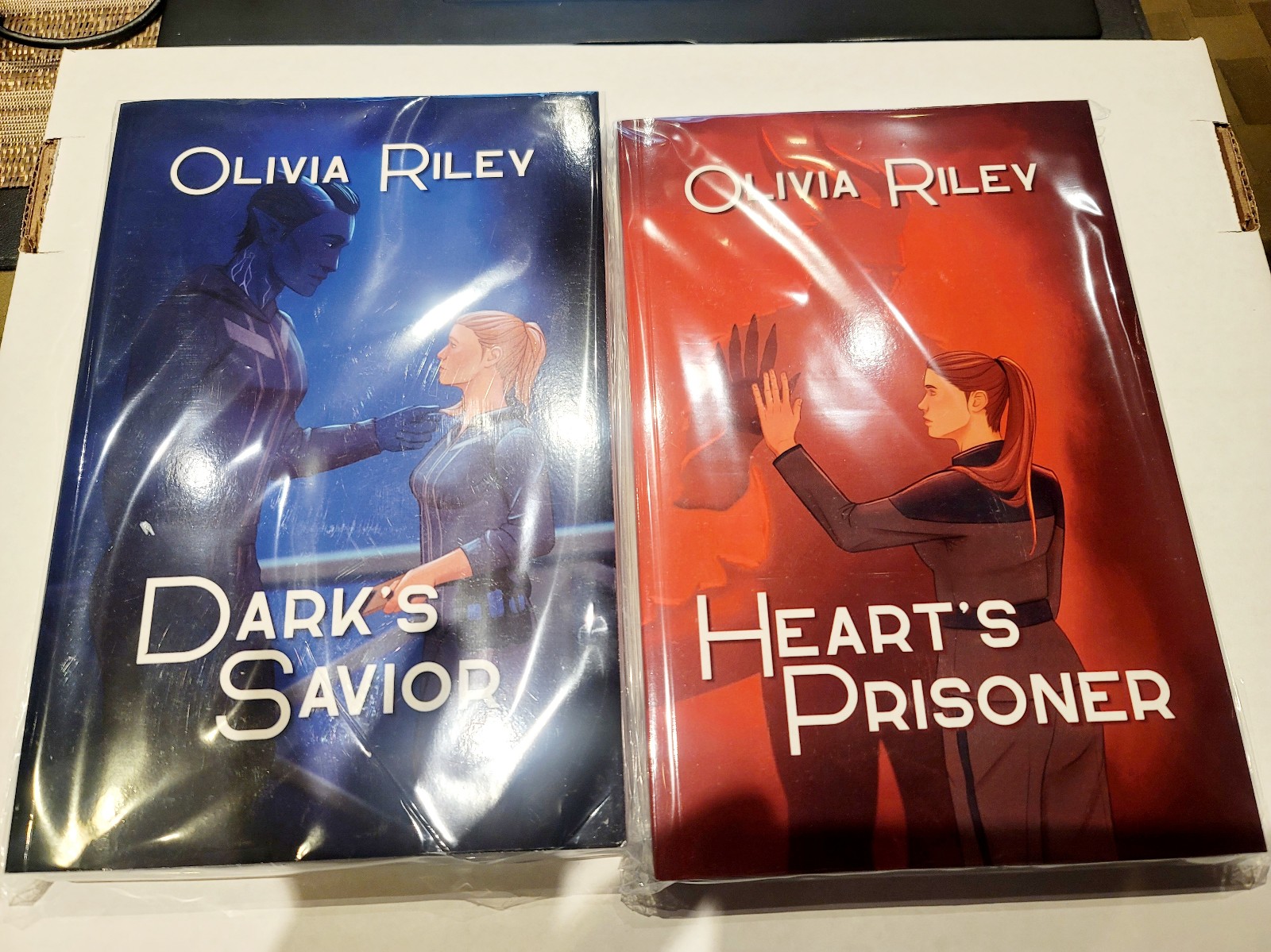 Olivia Riley Heart's Prisoner & Dark's Savior Renegade romance dark world mates